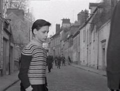 A young boy sends a German officer away