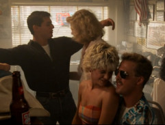 Maverick and Goose sing in the bar